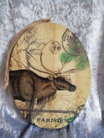 ovalen_houten_bord_met_rendier